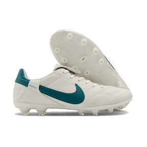 Chuteira Nike Premier 3 FG Branca e Verde com design clássico e sola para campos.