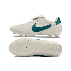 Chuteira Nike Premier 3 FG Branca e Verde - design clássico com couro premium e sola FG para desempenho em campo.