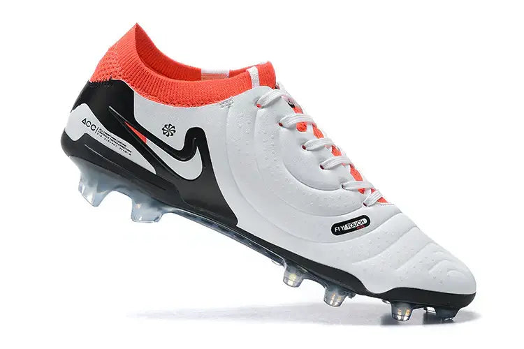 Chuteira Nike Tiempo Legend 10 FG - Branca, Vermelha e Preta vista lateral com design moderno e couro premium.