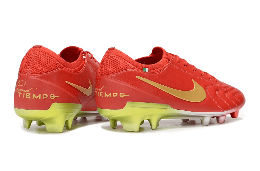Chuteira Nike Tiempo Legend X Elite FG Vermelha com detalhes em dourado e solado verde-limão.