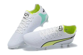 Chuteira Puma King Ultimate FG Branca e Verde com design sofisticado e tecnologia premium para futebol.