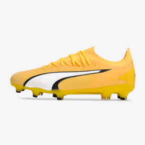 Chuteira Puma Ultra Ultimate FG Amarela lateral em destaque, ideal para desempenho em campo.