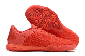 Chuteira Futsal Nike React Gato IC - Vermelha com solado destacado, ideal para quadras internas e desempenho atlético