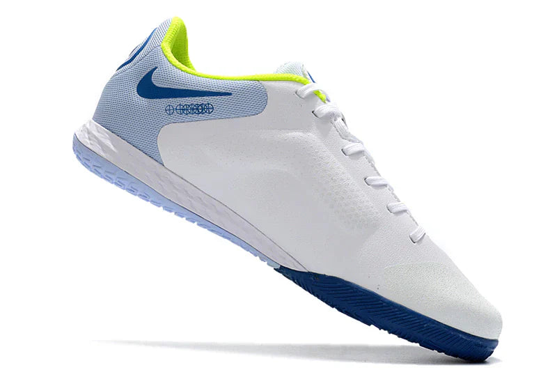 Chuteira Futsal Nike Tiempo Legend 9 Elite IC na cor branca com detalhes em azul e amarelo
