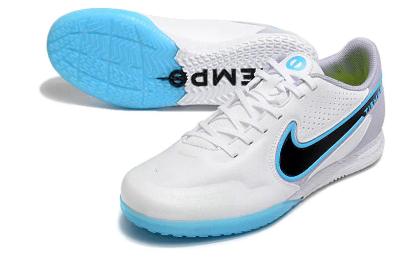Chuteira Futsal Nike Tiempo Legend 9 Elite IC na cor branco e azul, ideal para performance em quadra.