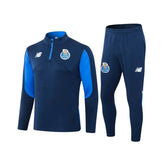 Conjunto FC Porto 24/25 Olympic com camiseta e calça, ideal para torcedores do time.