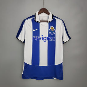 Camisola FC Porto Home 03/04 retro branca com detalhes azuis, disponível na OLYMPIC STORE.