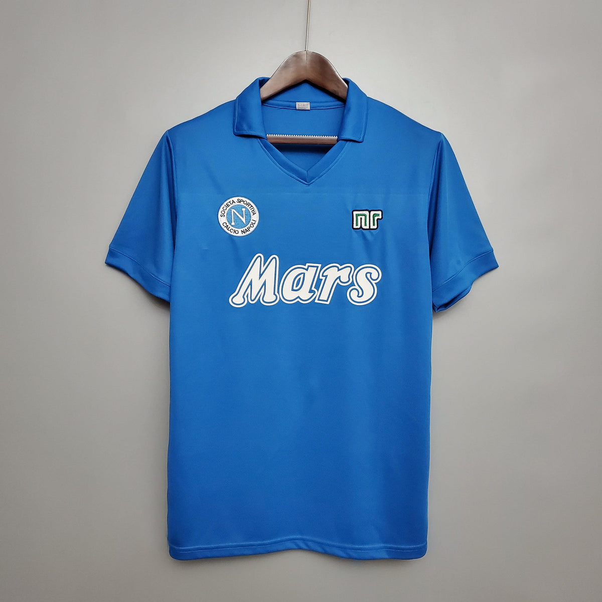 Camisolas Napoli Home 88/89 Retro em tom azul com logotipo da Mars, disponível na OLYMPIC STORE.