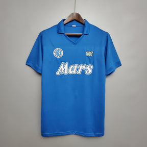Camisolas Napoli Home 88/89 Retro em tom azul com logotipo da Mars, disponível na OLYMPIC STORE.