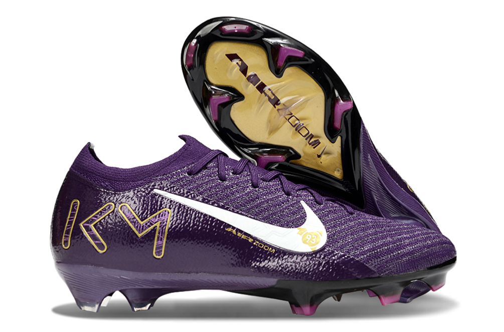 Nike Mercurial Vapor 16 KM Edição Especial FG Roxa em roxo vibrante com detalhes em amarelo e sola FG.
