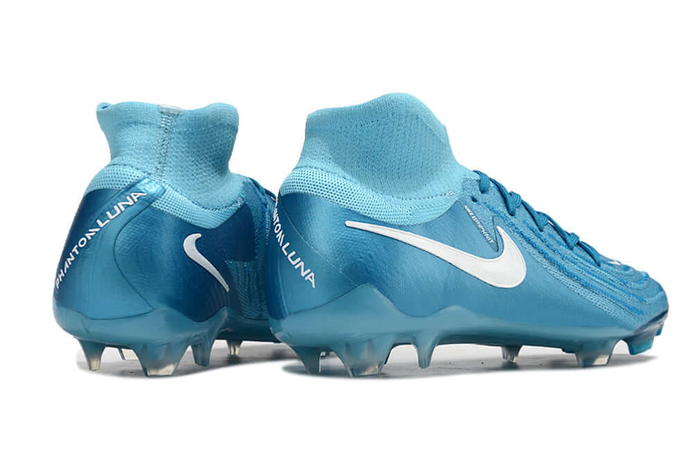 Nike Phantom Luna Elite NU FG Azul "Mad Ambition Pack" com design inovador e tecnologia de ponta para futebol.