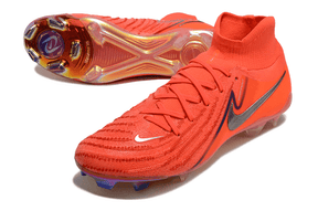 Nike Phantom Luna Elite NU FG "Halaand" em laranja, destacando tecnologia de desempenho e controle para jogadores.