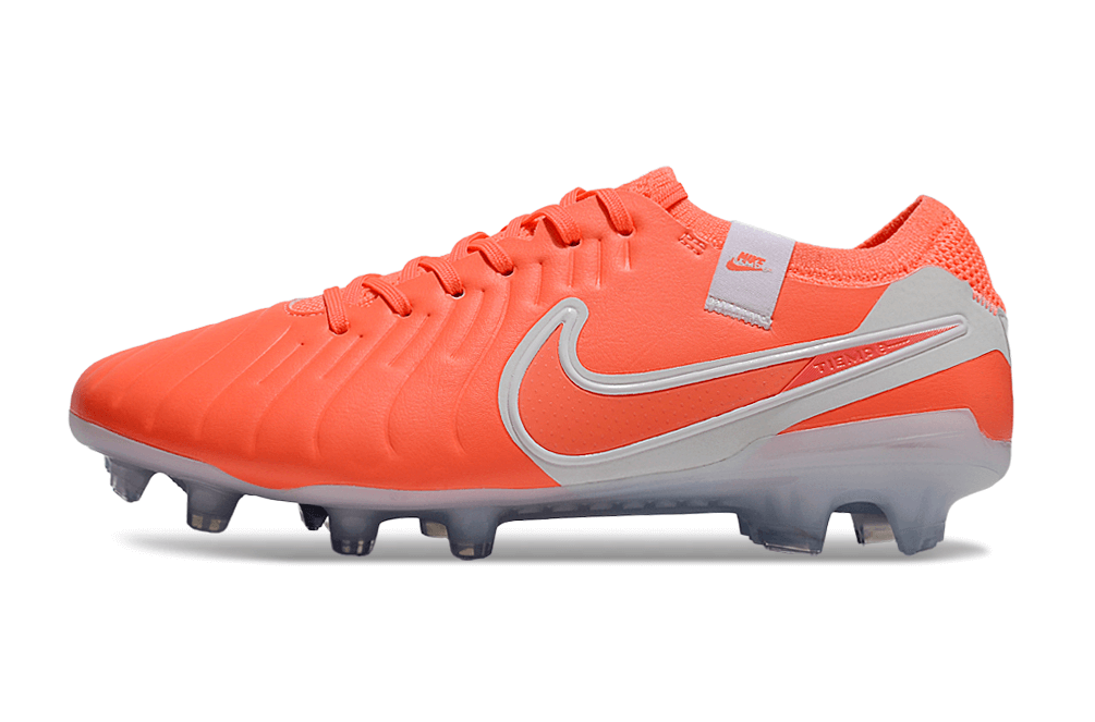 Nike Tiempo Legend 10 FG -  Laranja e Branca - Pack Mad Energy, chuteira de futebol vibrante e inovadora.
