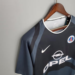 Camiseta PSG Away 01/02 Retro Azul Olympic com detalhes em cinza e logo da Opel
