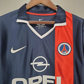 Camisa PSG Home 01/02 Retro Azul Olympic com logo e detalhes em vermelho e azul.