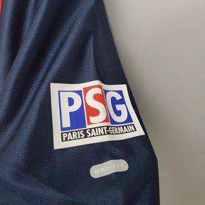 Logotipo do PSG Home em uniforme azul retro, Paris Saint-Germain DRI-FIT.