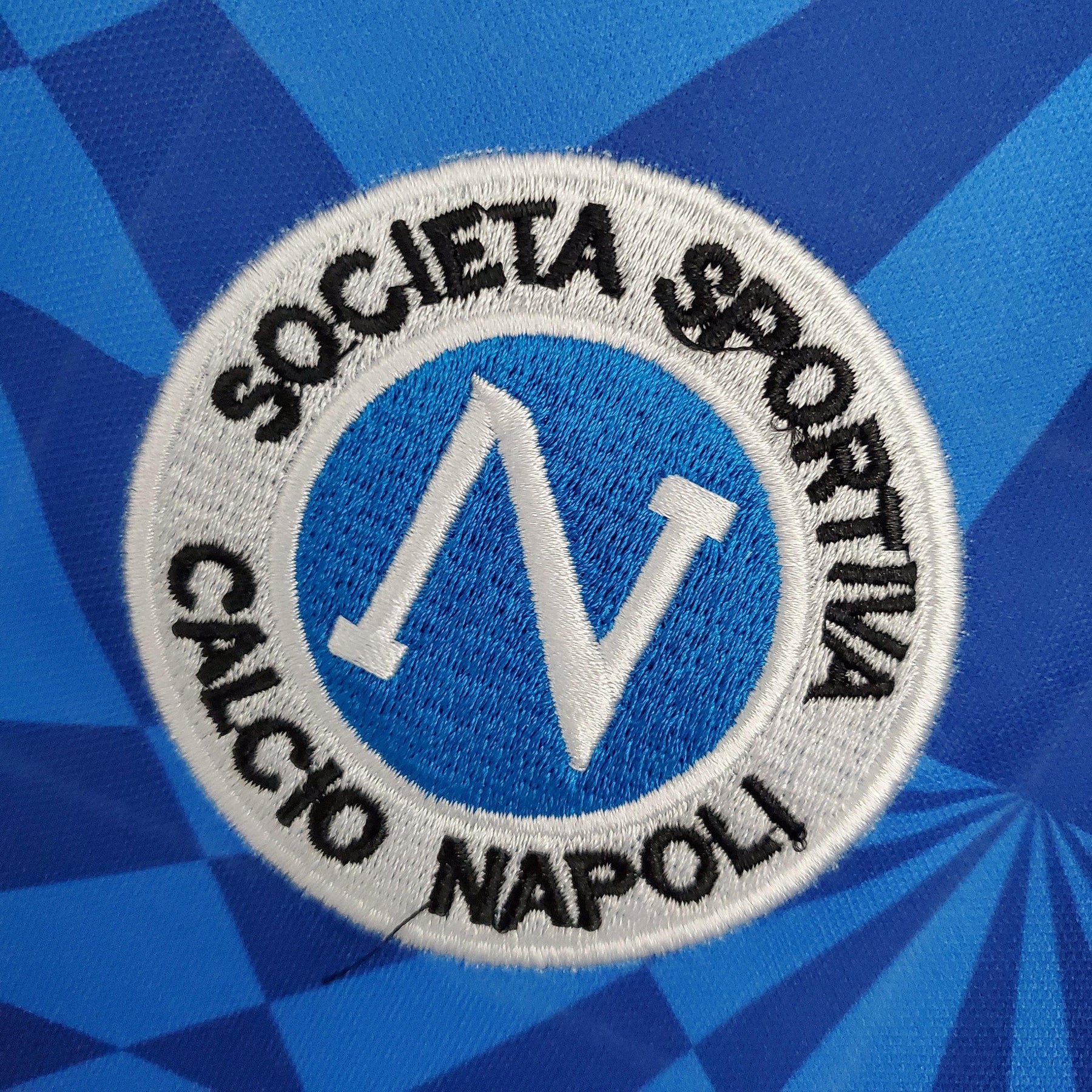 Emblema da Camisolas Napoli com o logotipo da Società Sportiva Calcio Napoli.